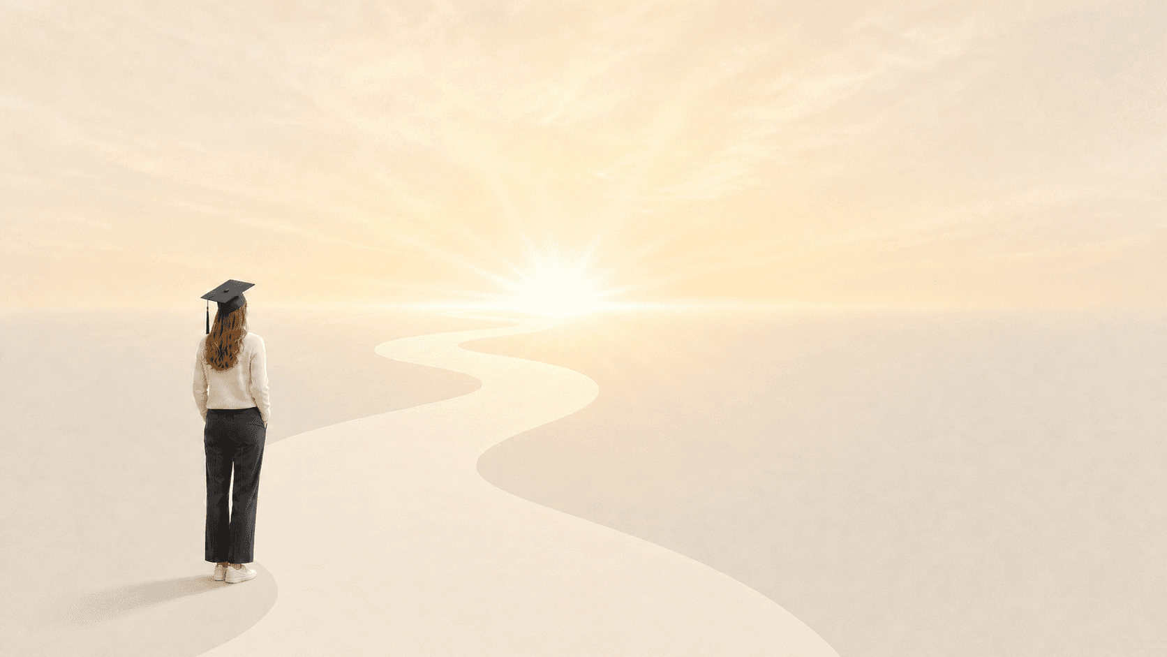 A graduate looking toward a bright path ahead